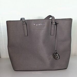 Michael Kors gray shoulder bag.